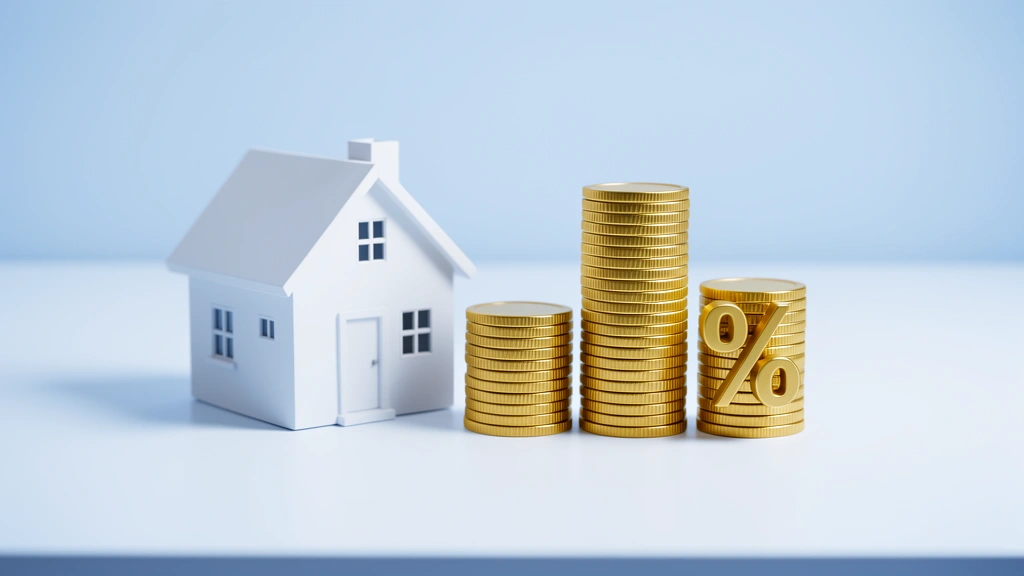 Model house beside rising stacks of gold coins and a percent symbol, representing how much down payment you need