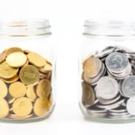 Two labeled retirement savings jars side by side, one marked taxed now and one marked taxed later, representing a Roth IRA versus a traditional IRA, no text-in-image