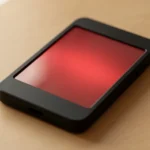 A scientific calculator on a plain desk with a red Error message on its screen, no text, no numbers, no real person's hands or face