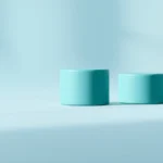 Soft 3D stylized piggy bank beside three rising stacked blocks and a small upward arrow on a clean studio backdrop, teal and amber palette, no text or numbers